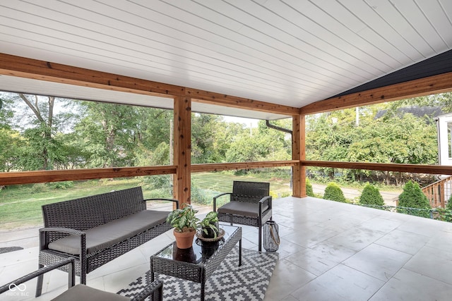 sunroom / solarium with vaulted ceiling and wood ceiling