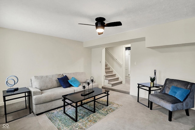 22 W 54th St, Indianapolis, IN 46208 - living area featuring a ceiling fan, light carpet, and stairs