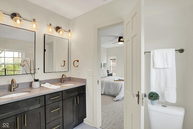 22 W 54th St, Indianapolis, IN 46208 - ensuite bathroom with a healthy amount of sunlight, connected bathroom, and a sink