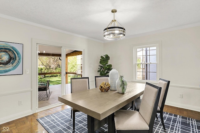 22 W 54th St, Indianapolis, IN 46208 - dining room with crown molding, baseboards, and plenty of natural light