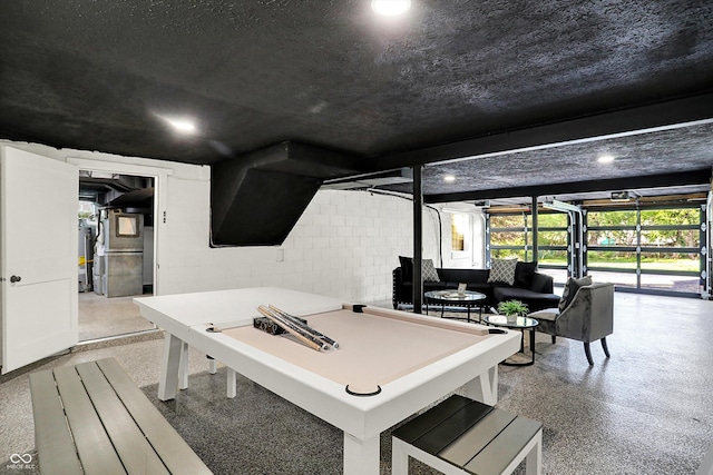 22 W 54th St, Indianapolis, IN 46208 - recreation room featuring concrete block wall, recessed lighting, speckled floor, and pool table