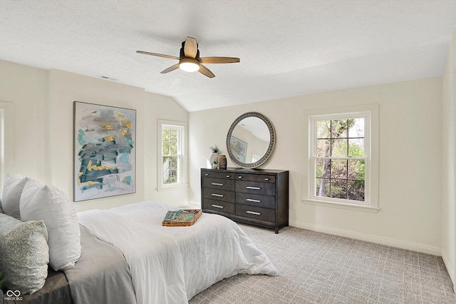 22 W 54th St, Indianapolis, IN 46208 - bedroom with light colored carpet, ceiling fan, baseboards, a textured ceiling, and lofted ceiling