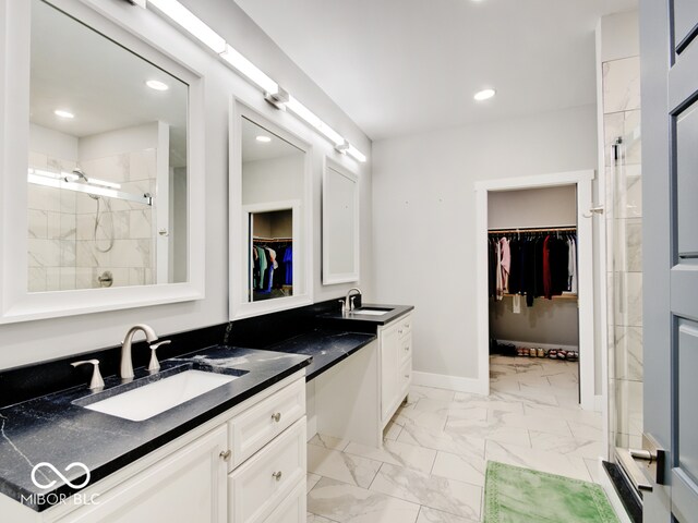 bathroom with vanity and an enclosed shower