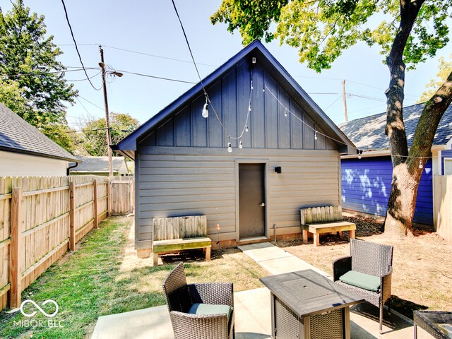 rear view of property featuring a patio area