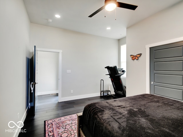 bedroom featuring ceiling fan and dark hardwood / wood-style floors