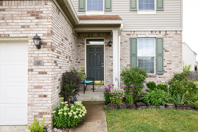 entrance to property with a garage