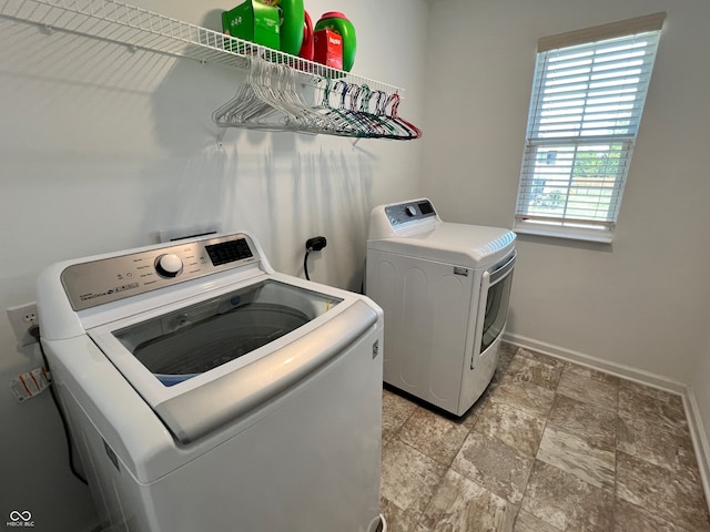 laundry area featuring washer and clothes dryer