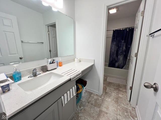 bathroom with vanity and shower / bath combo with shower curtain