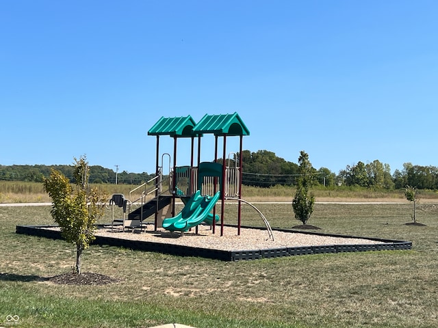 view of play area with a yard