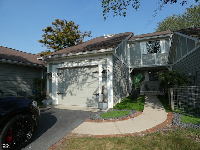 view of side of property with a garage