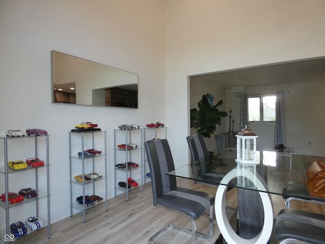 dining area featuring light wood-type flooring