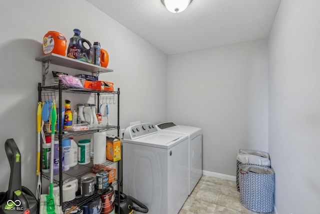 laundry room featuring washing machine and clothes dryer