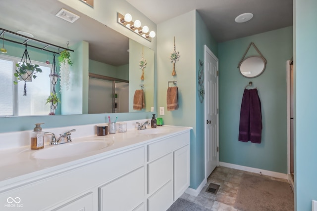 bathroom with vanity and walk in shower