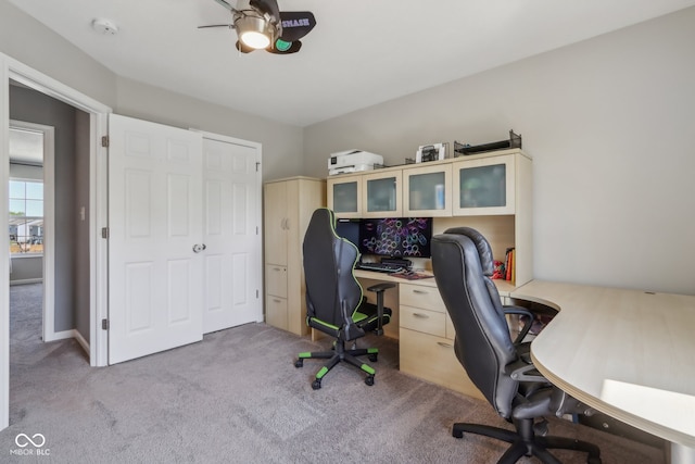 office with ceiling fan and light colored carpet