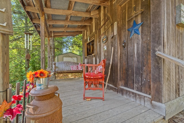 deck featuring a storage unit