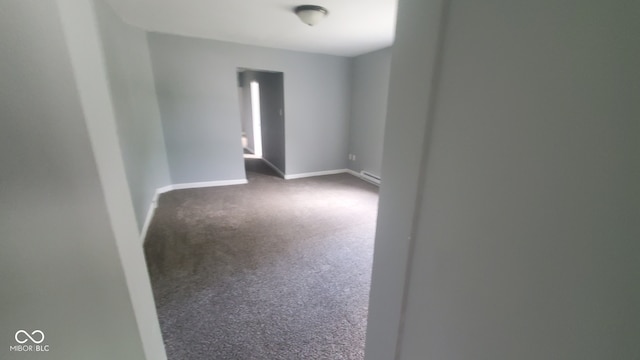 spare room featuring carpet flooring