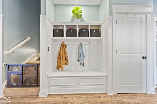 mudroom with hardwood / wood-style flooring