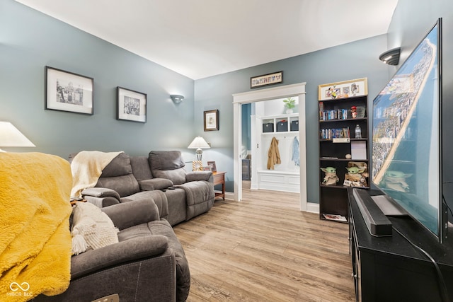 living room with light hardwood / wood-style floors