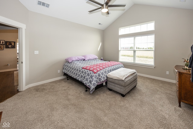 bedroom featuring carpet, ceiling fan, and vaulted ceiling