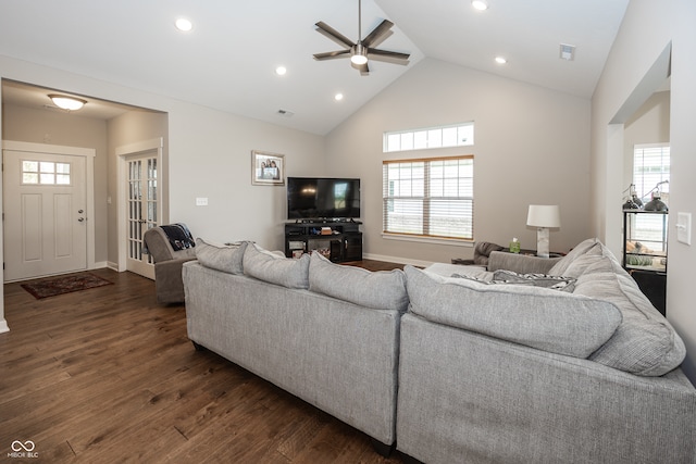 living room featuring ceiling fan, dark hardwood / wood-style floors, and high vaulted ceiling