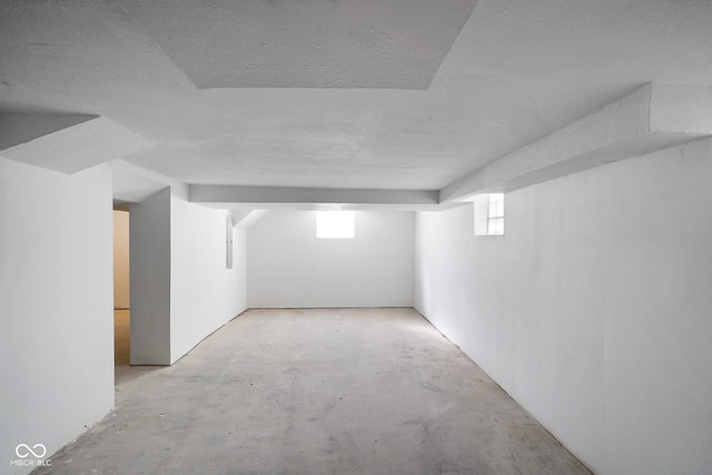 basement with a textured ceiling