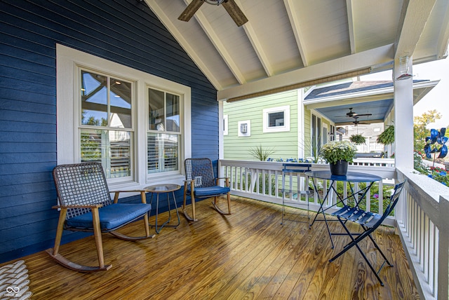 deck featuring a porch and ceiling fan