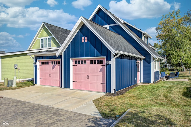 garage with a yard