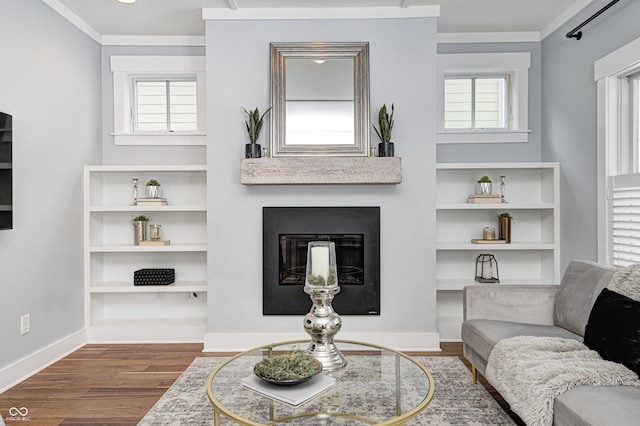 living room with ornamental molding, plenty of natural light, and dark hardwood / wood-style floors