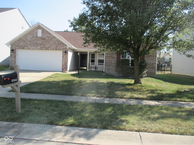 ranch-style house with a garage and a front yard