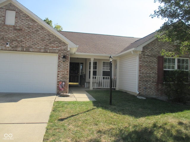 single story home featuring a garage and a front lawn