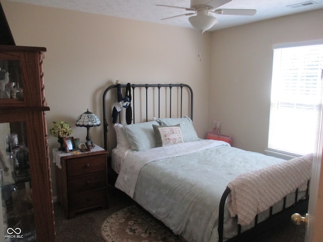 bedroom featuring carpet flooring and ceiling fan