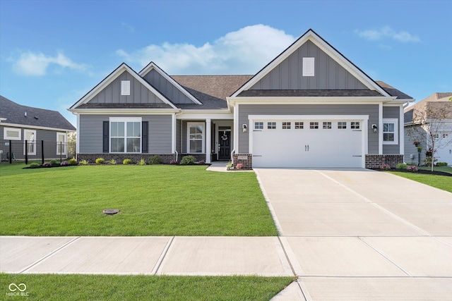 craftsman-style house with a garage and a front yard