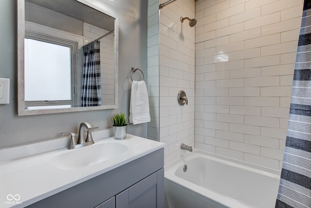 bathroom featuring vanity and shower / bath combo