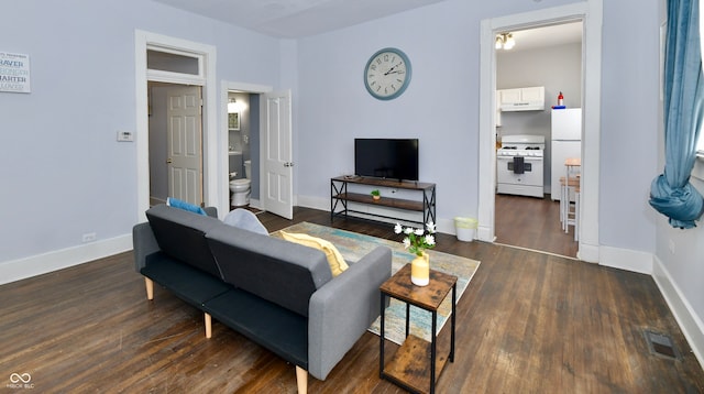 living room with dark wood-type flooring