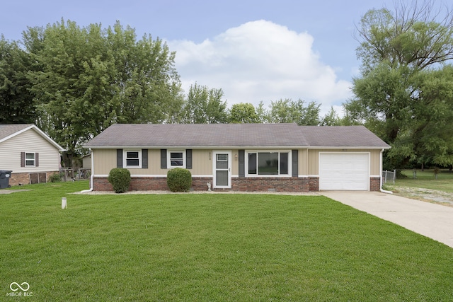 single story home featuring a front lawn and a garage