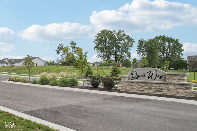 view of community sign