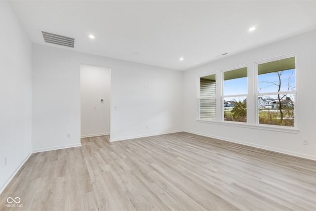 empty room featuring light hardwood / wood-style floors