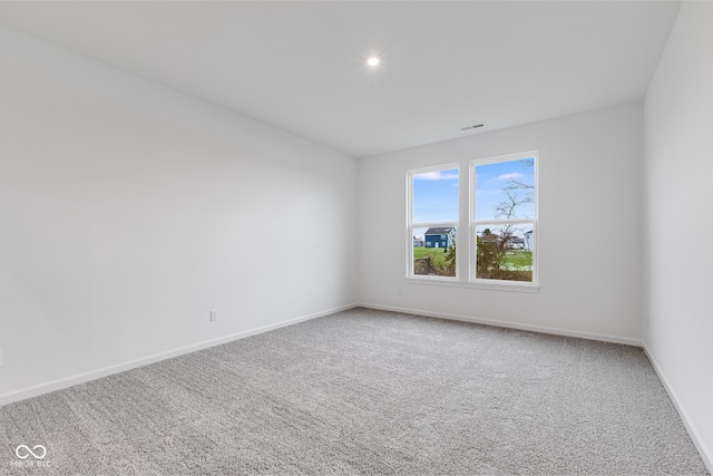 unfurnished room with carpet