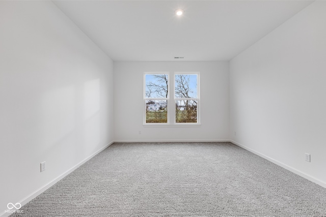 empty room featuring carpet floors