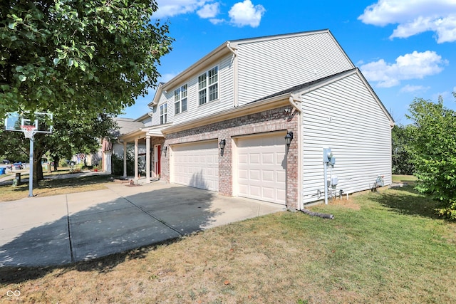 view of property exterior featuring a garage and a yard