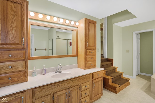 bathroom with vanity and an enclosed shower