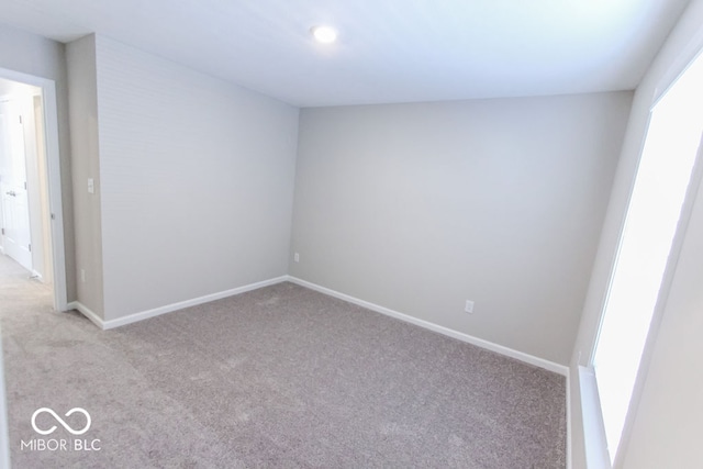 view of carpeted spare room