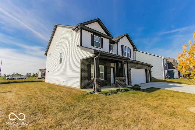 view of front facade with a front lawn and a garage