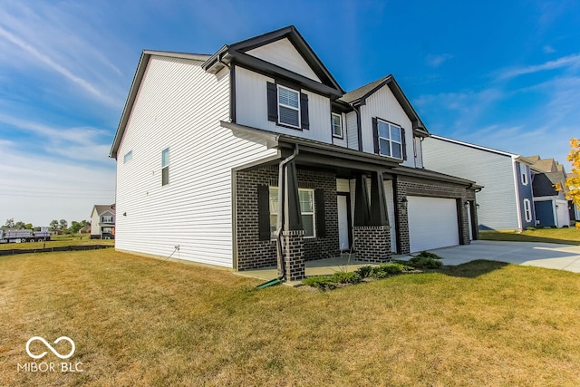 view of front of home featuring a garage and a front yard