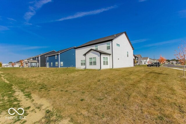 view of home's exterior with a lawn