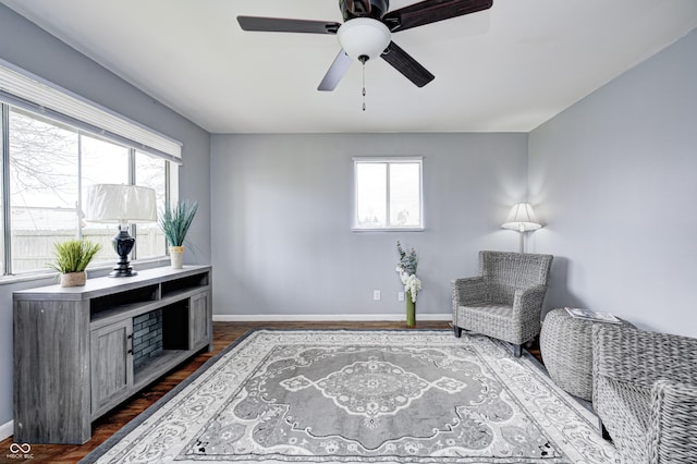 120 Hugo St, Indianapolis, IN 46229 - sitting room featuring a wealth of natural light, dark wood-style floors, baseboards, and ceiling fan