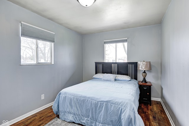 120 Hugo St, Indianapolis, IN 46229 - bedroom with baseboards and wood finished floors