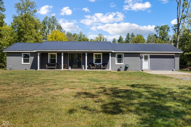 ranch-style home featuring a porch and a front yard