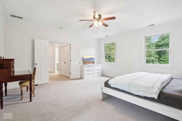 carpeted bedroom with ceiling fan