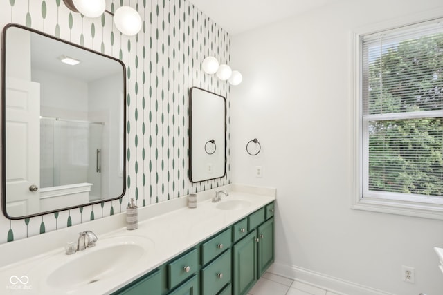 bathroom with vanity, tile patterned flooring, and an enclosed shower